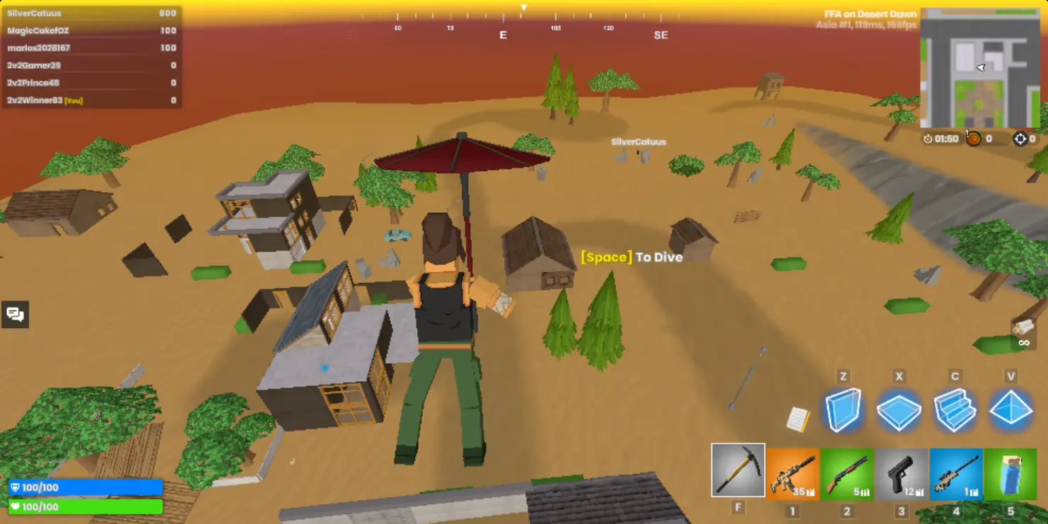 2v2 IO player gliding above the Desert Dawn map before landing, with the minimap, weapons, and building controls visible